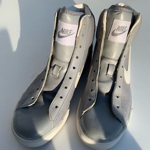 Used Nike gray high top. Embossed leather. Size 8. No laces included
